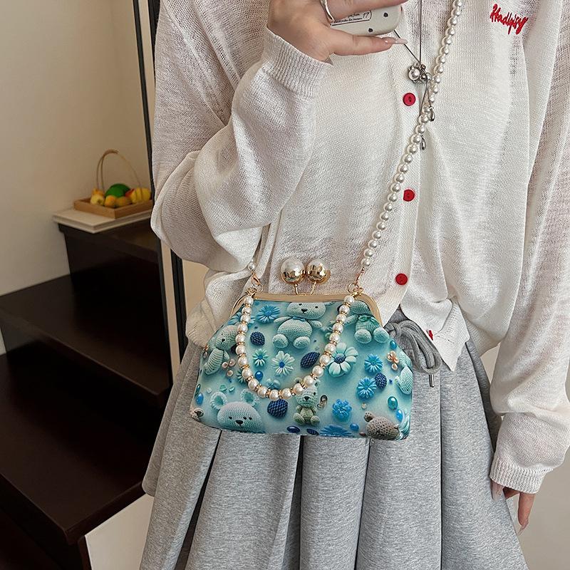 Cartoon printed bag women's 2025 new clip bag light shoulder commuter bag fashionable sweet fresh messenger bag