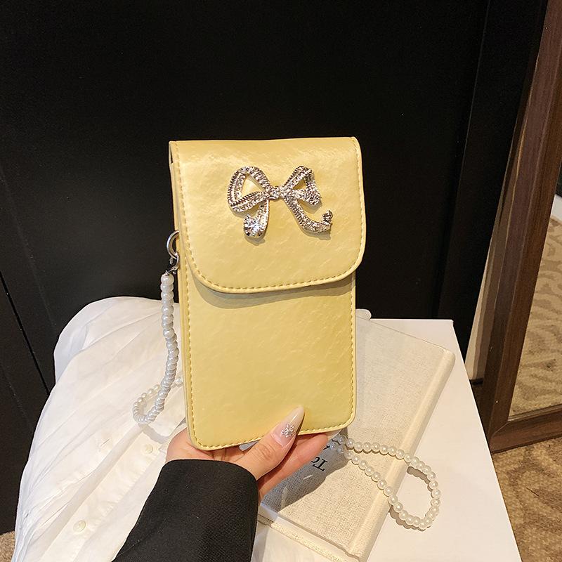 

Mini small bag 2025 new Mori soft girl fashion bow foreign style versatile pearl chain small square bag tide срібний