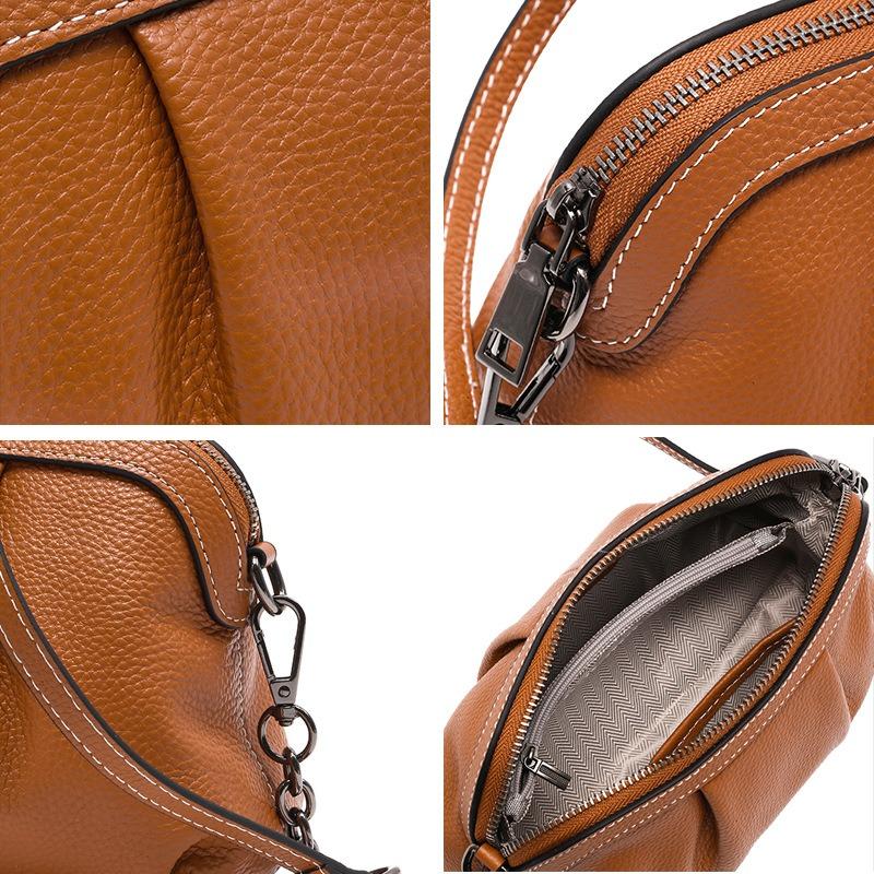 The first layer of cowhide small bag, the new versatile shoulder bag, simple pleated bag, messenger bag.
