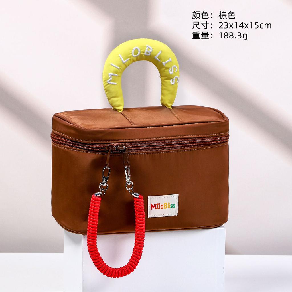 Cosmetic bag Large capacity cute contrasting color portable waterproof toilet bag Women's skin care product storage bag