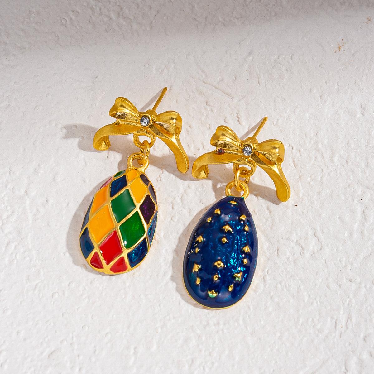 

Contrasting color drip oil with diamonds, water drop bow necklace, unique personality, temperament and sense of jewelry