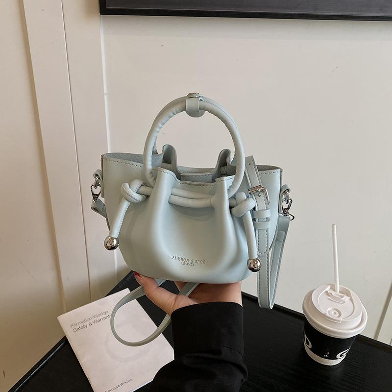 Hand Carry Child and Mother Portable Bucket Bag 2025 New Popular Simple Fashion Niche Shoulder Messenger Bag