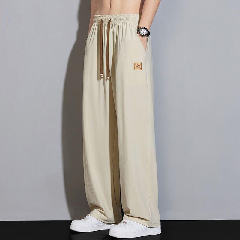 

Летние ультратонкие мужские повседневные брюки из ледяного шелка, с ледяным ощущением, эластичные, спортивные, модные, свободные, прямые, широкие брюки 4XL