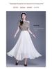 Elegant Mesh Draped Midi Skirt - Spring 2026 Collection: Irregular Hem & Pleated Design