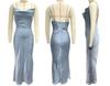 Women's Urban Fashion Solid Color Dress with Deep V-neck, Slim Fit, and Spaghetti Straps for Spring/Summer 2024.