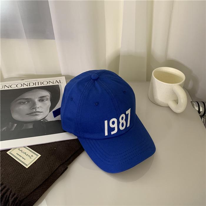 

New Spring/Summer Women s Hats from Korea1987Baseball cap for couples, fashionable and versatile, casual sun hat Adjustable сапфірове скло синього кольору кольору