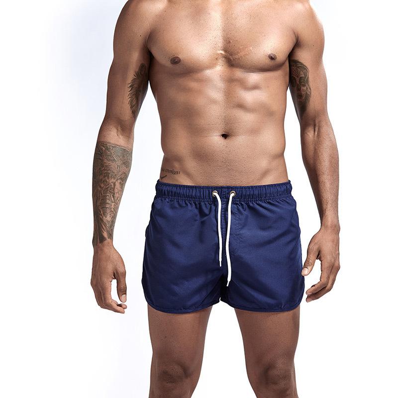 Sommer strandbukser for menn Badebukser Løse fitness Basketball Nattløp Hurtigtørkende sportsshorts som puster