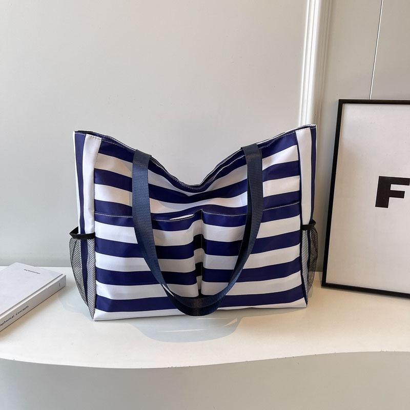 

Модная полосатая женская сумка большой вместимости Новая наплечная сумка-тоут Большая вместимость Холщовая сумка-тоут темно-синий