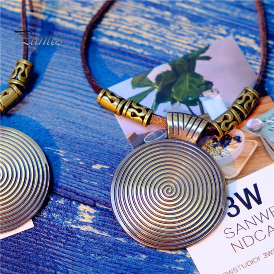 Vintage Women\'s Ethnic Faux Leather Spiral Disc Round Pendant Sweater Necklace