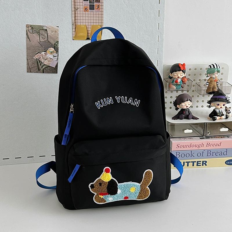 Schoolbag new cute puppy backpack large capacity primary school students junior high school students lightweight schoolbag simple fashion alphabet 