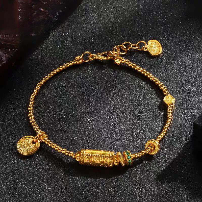 Lucky Goddess Gold-Color Ethnic Bracelet with Engraved Barrel Beads and Tibetan Rope.