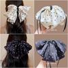 Polka Dot Bow Claw Clip: Elegant Women's Hair Accessory