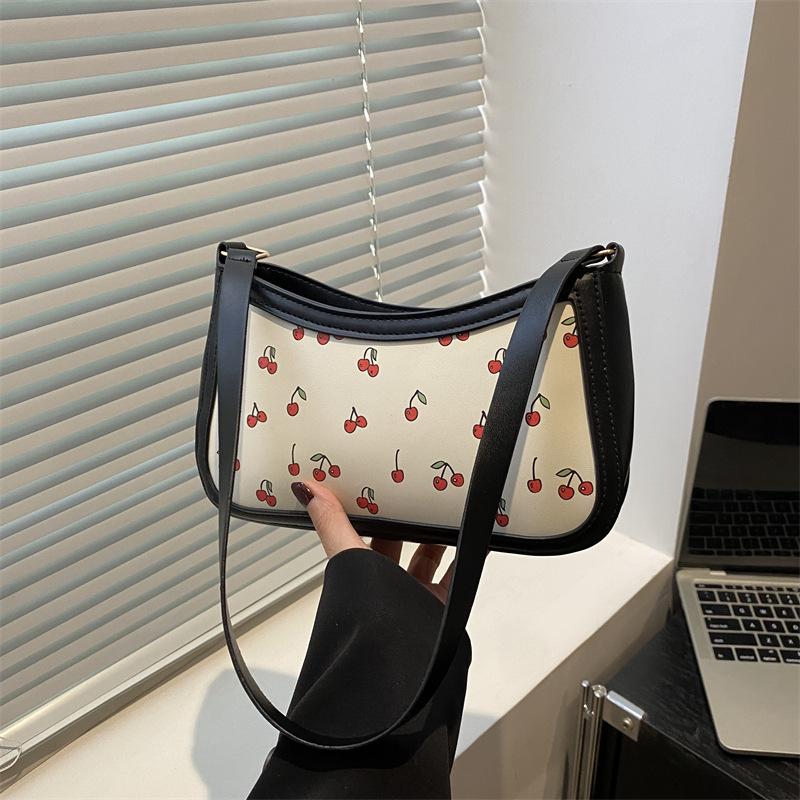 

New trend printing casual fashion versatile light shoulder armpit bag new hand bag чорний