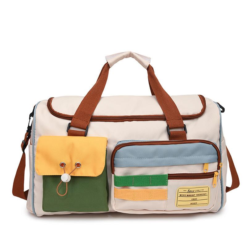 New fashionable contrasting colors large-capacity short-distance travel bag autumn new casual and lightweight hand luggage bag women