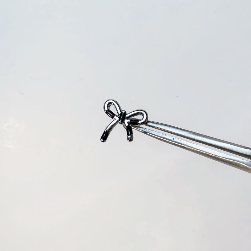 

22 Ding Mu Black Heart Ear Ring Earring Ear Clip Titanium Steel Ear Ear Bone Pin Sweet Cool Bow Stud Earrings Female 1# Black color matching Bows stud earrings