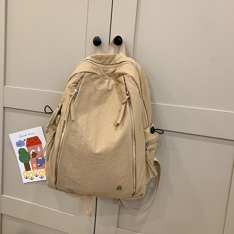 Schoolbag new lightweight and simple raw schoolbag Korean version ins college style junior high school college backpack solid color versatile backpack