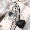 Luxury Charm Tassel Love Heart Bag Pendant Handmade Creative Bowknot Hangbag Backpack Hanging Cute Glossy Bag Accessories AVE