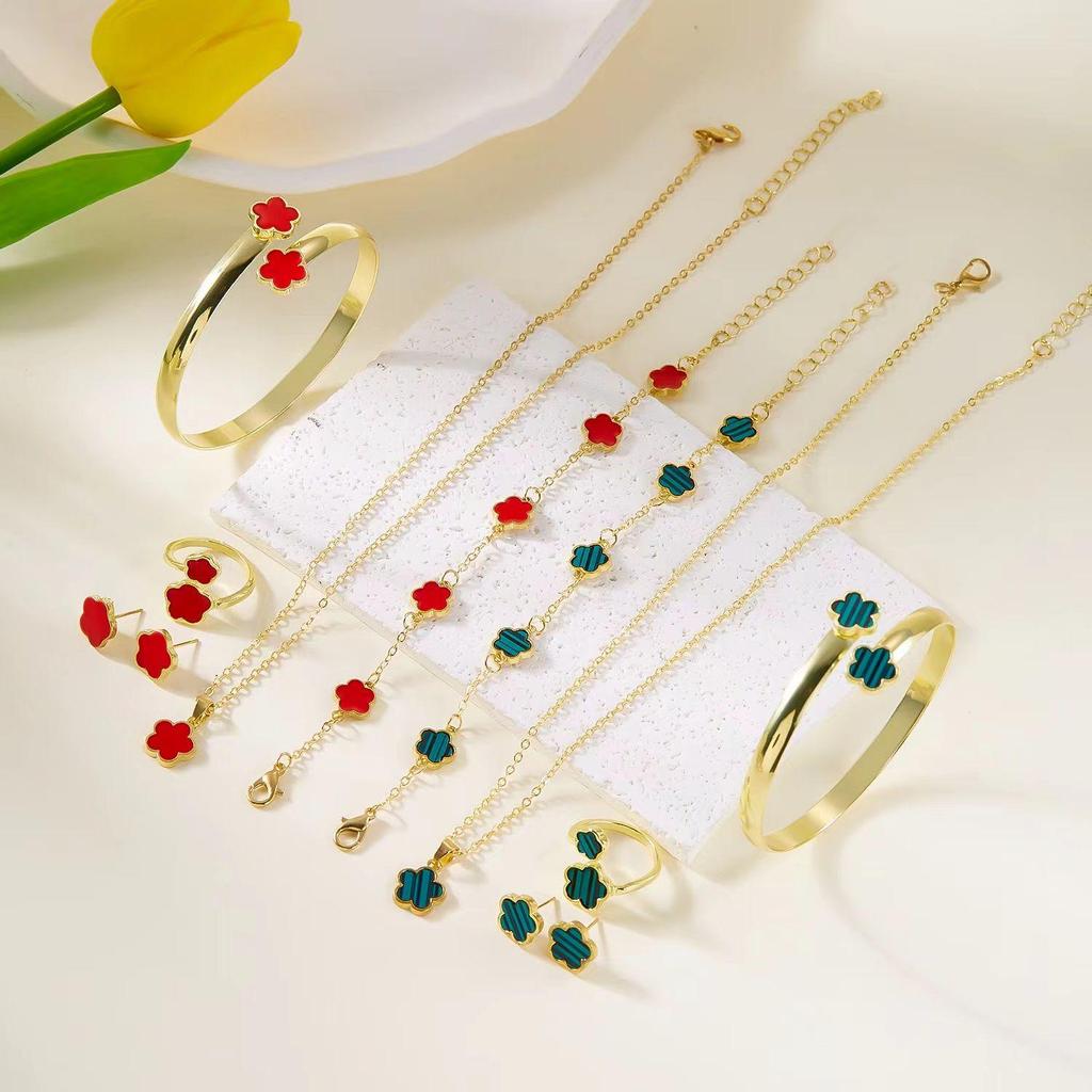 Elegant 5-Piece Flower Jewelry Set: Necklace, Bracelet, Earrings, and Ring.