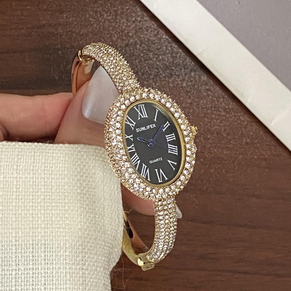 Sunlifex Diamantbesetzte ovale Zifferblatt Armbanduhr für Damen Quarzarmband Berühmte Marke Damenarmbanduhren Saati Relojes