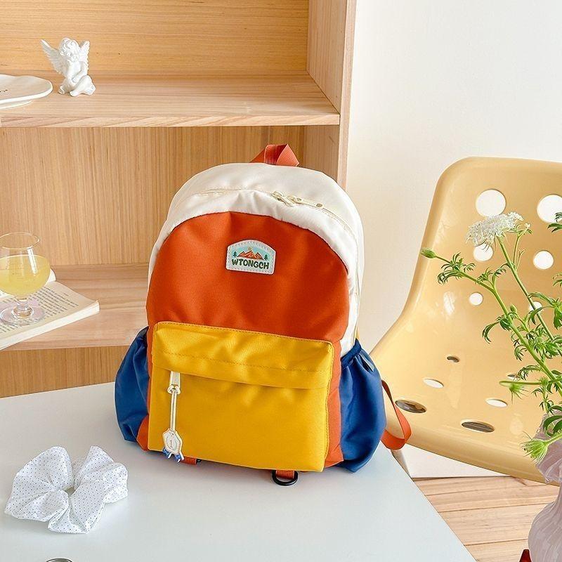 

Large, medium and small color matching kindergarten schoolbag tide boys Korean version girls light backpack primary school students travel backpack small (1-3 years old, width 22 and height 28 cm)