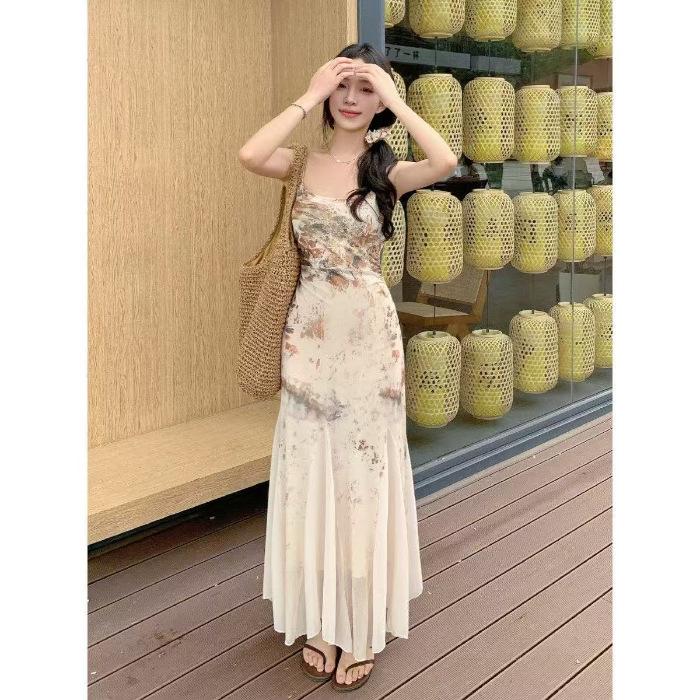 Summer light luxury suspender dress women's spring waist and thin belly and hip long dress design sense national style floral skirt