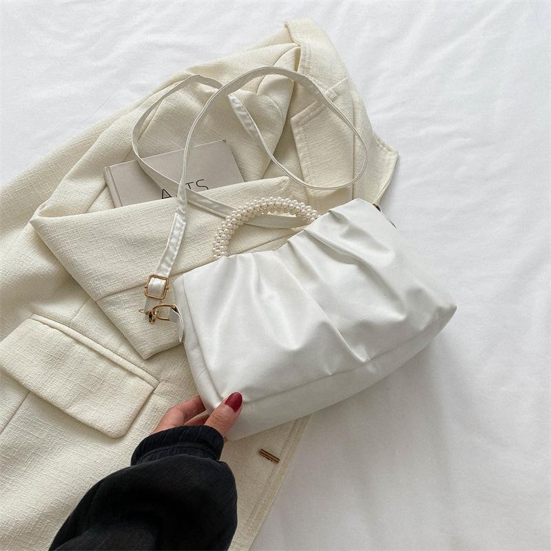 Gefaltete Mode ausländischer Stil Perlenhandtasche 2025 Frühling neu vielseitig ins Textur Schulter Messenger kleine quadratische Tasche
