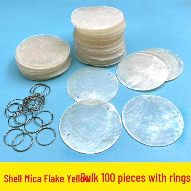 

Свадебный колокольчик ветра из натуральной перламутровой ракушки и бисерное украшение