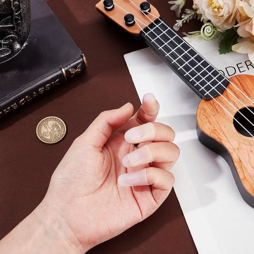 Roczential 4-Piece Silicone Finger Cots for Guitar and Bass Guitar Players, Fingertip Protection, Finger Supports, Finger Protection Caps for Stringed