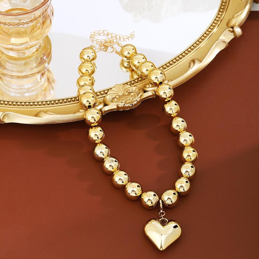 Elegante Set di Orecchini a Forma di Cuore e Bracciale Geometrico con Collana con Ciondolo a Cuore