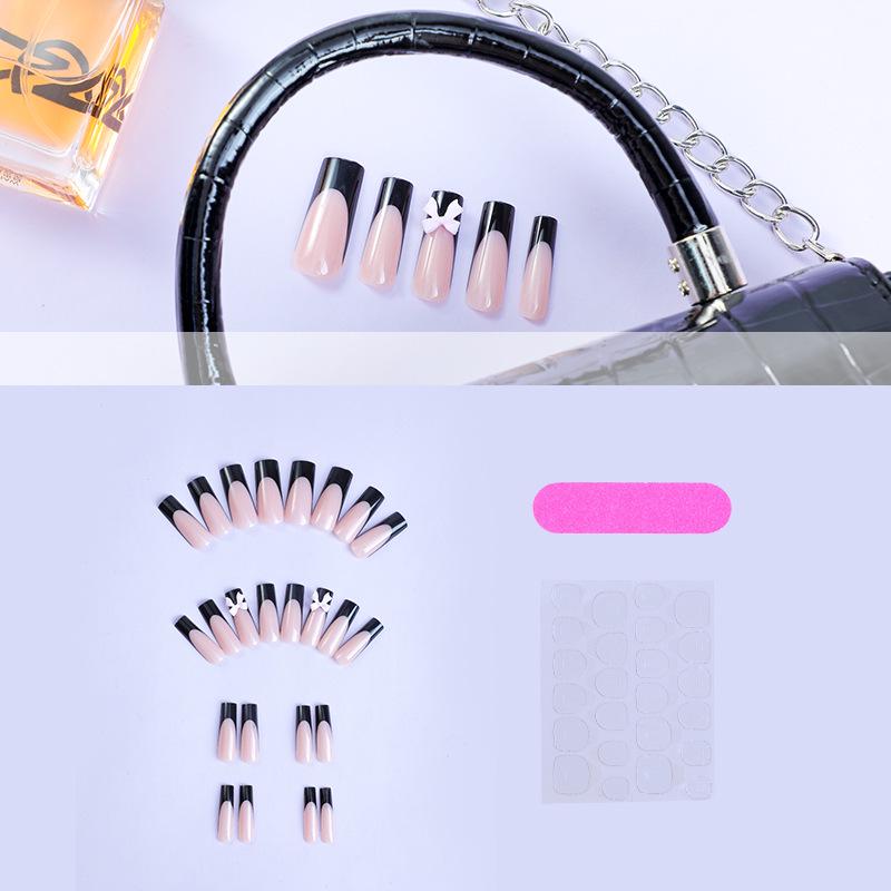 

Трендовые минималистичные черные французские типсы ручной работы с бантиками