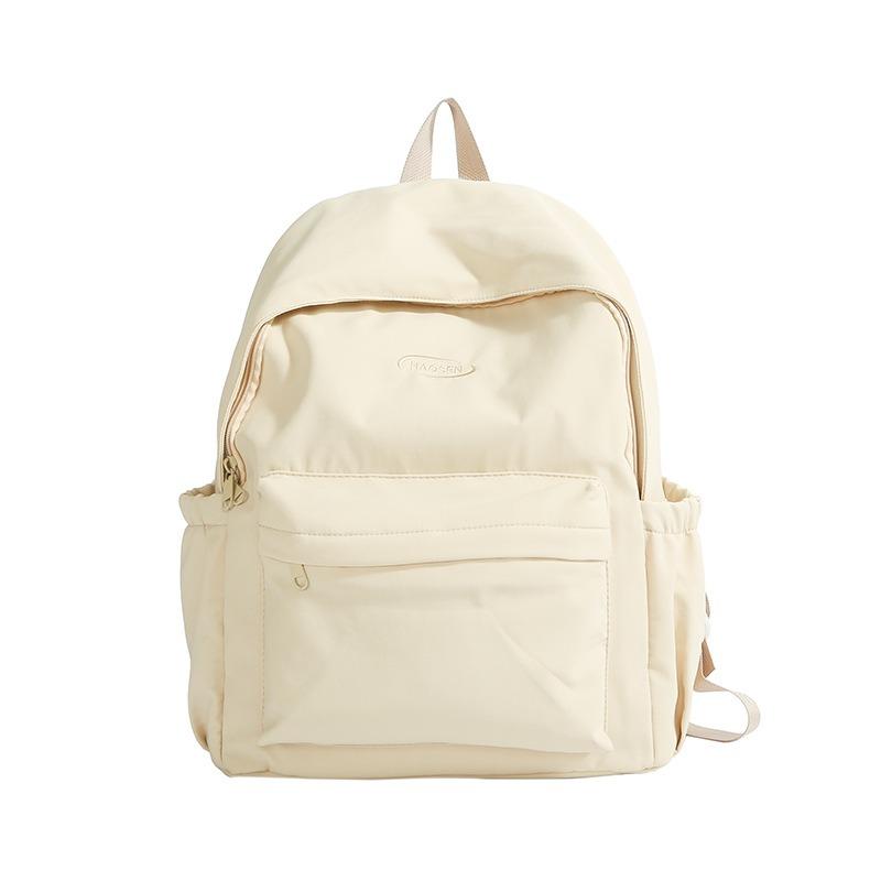 A Simple and Fashionable Backpack with A Large Capacity and A High-quality Texture. It Is A School Bag for Senior High School Students