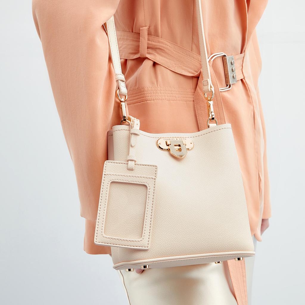 Charles & Keith Metal Buckle Versatile Pu Leather Shoulder Bag Underarm Bucket Bag Crossbody Bag Small Size Women bags Beige Black Multi CK2-10782094