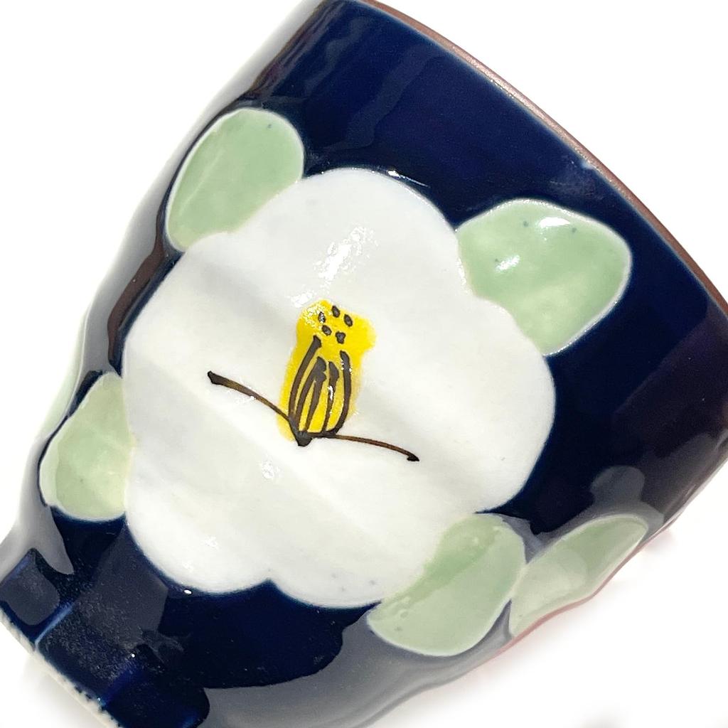 Hasami ware teacup, hand-painted by Yamashita Touen, with a glazed camellia design, navy.