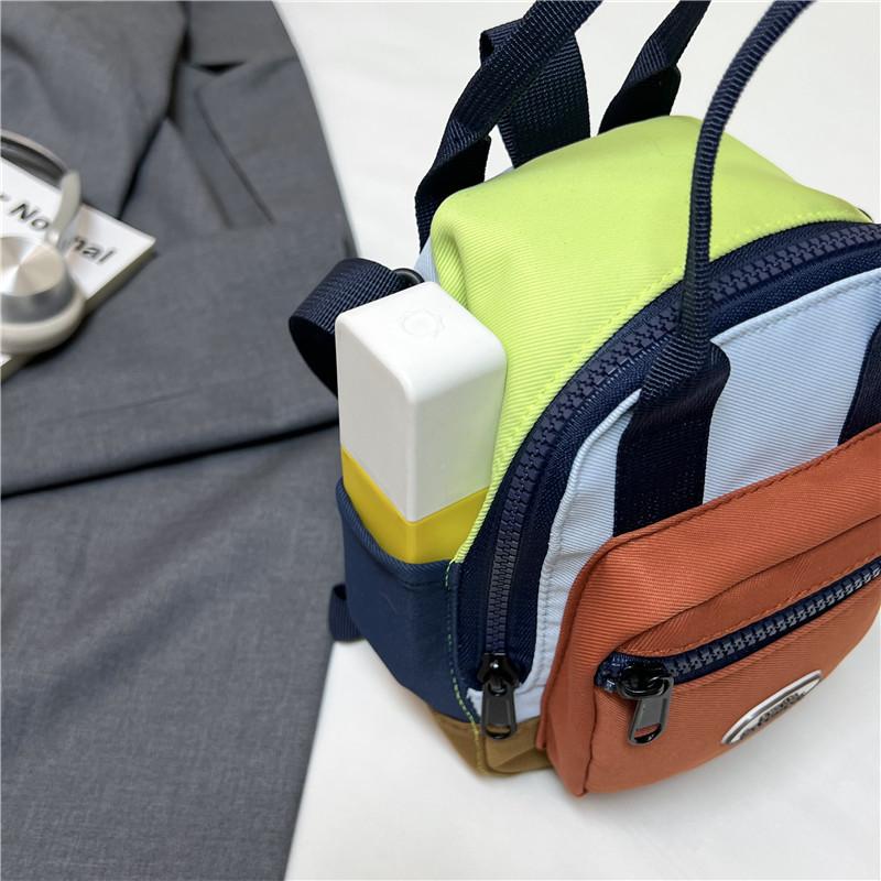 Mini small backpack women's 2025 new contrasting color shoulder bag shopping out high value mobile phone bag cute messenger bag