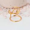 Abstract Wavy Gold Cuff Ring: Bold, multi-layered open design with organic lines, perfect as a modern adjustable statement ring.