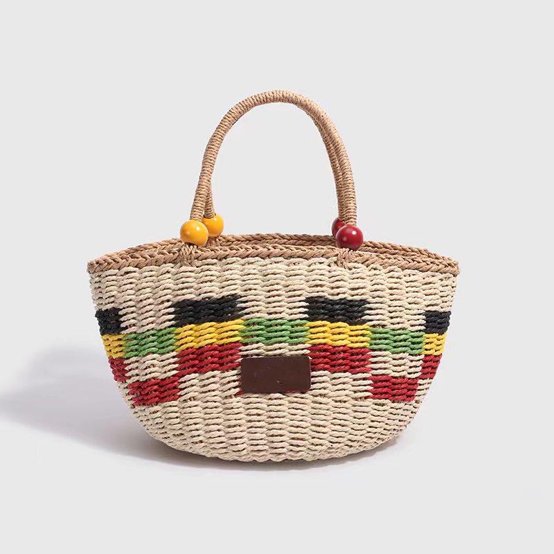 2023 Handmade Woven Straw Bucket Bag: Cute Picnic Basket with Tassel and Wood Bead Decoration