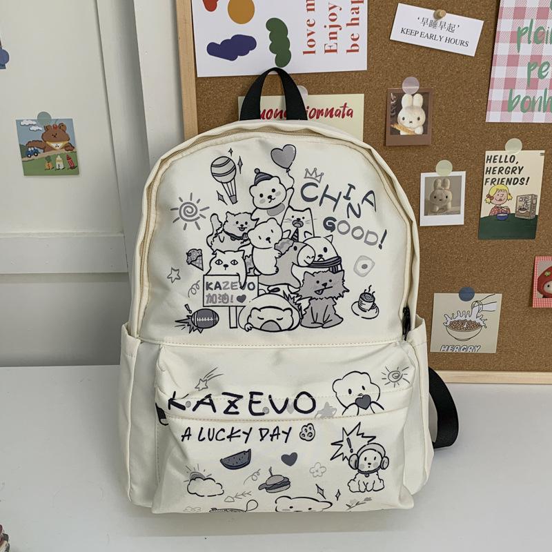 Die neue Schultasche ist ein hochwertiger, frischer, süßer und niedlicher Cartoon-Rucksack, ein leichter Rucksack für den Frühlingsausflug für Schüler der Sekundarstufe I