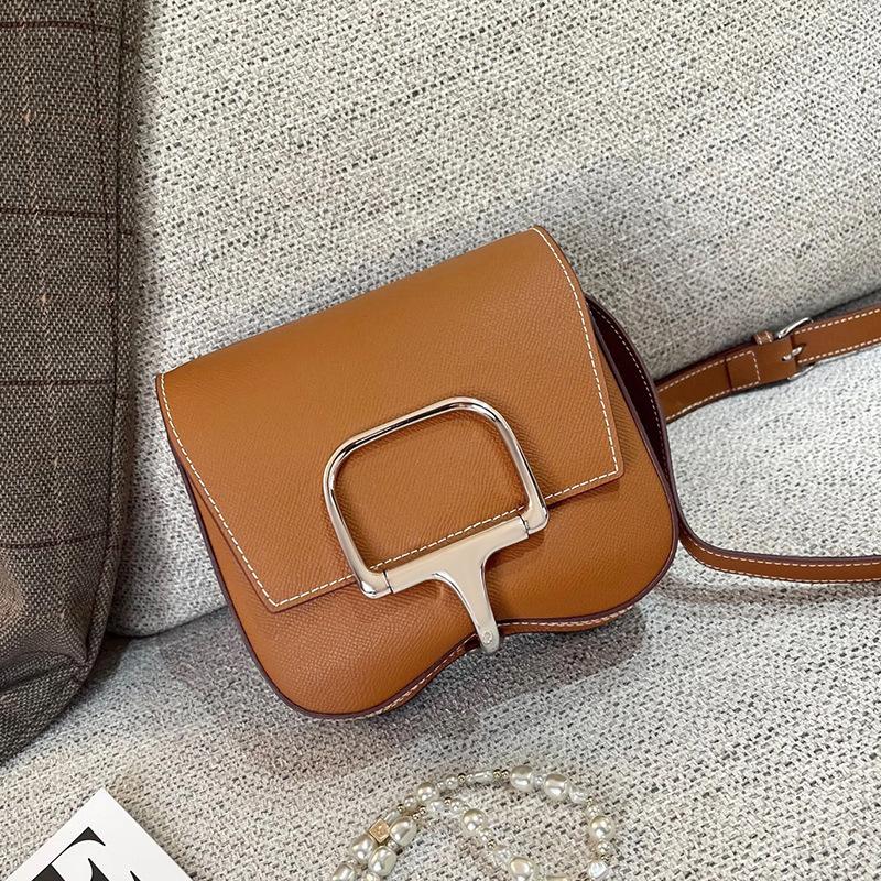 

Niche butt bag high-end cowhide saddle bag foreign trade new bag leather women s bag versatile shoulder messenger bag 17cm