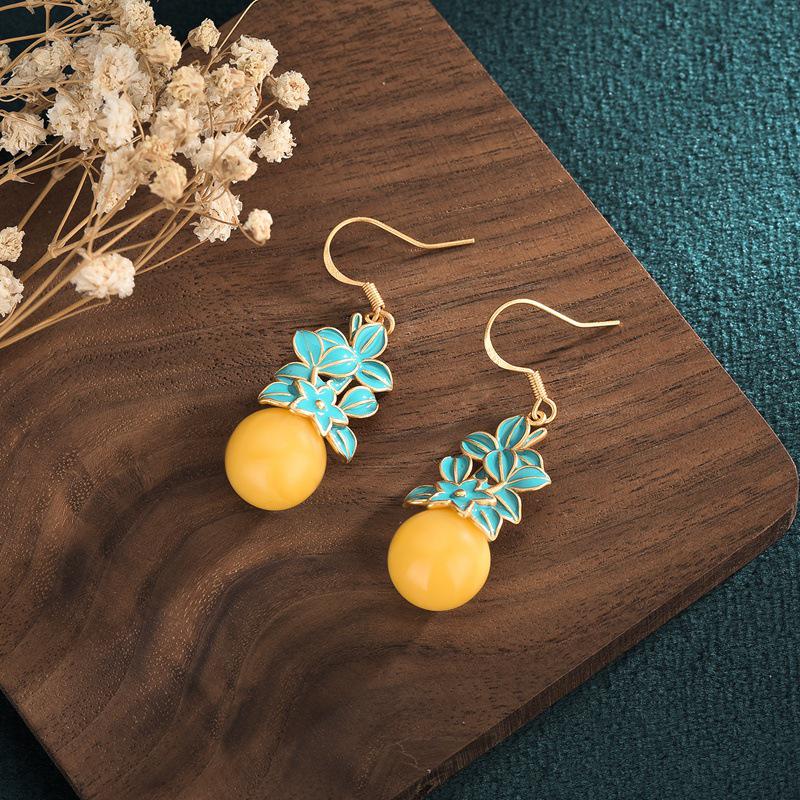 

Серьги из эмалированной меди с золотым покрытием в сказочном стиле с бусинами из имитации янтаря