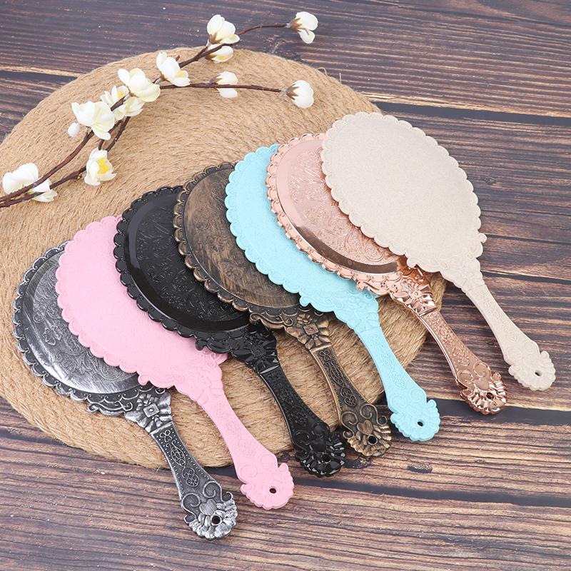 מראה איפור ידנית מגולפת וינטג' מראה ידנית עם ידית קוסמטיקה