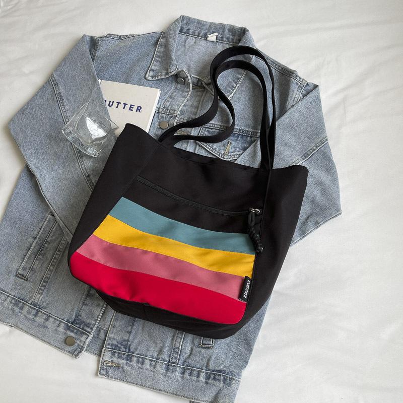 

2025 new contrasting color splicing nylon shoulder bag bag women s niche texture tote bag large-capacity student bag