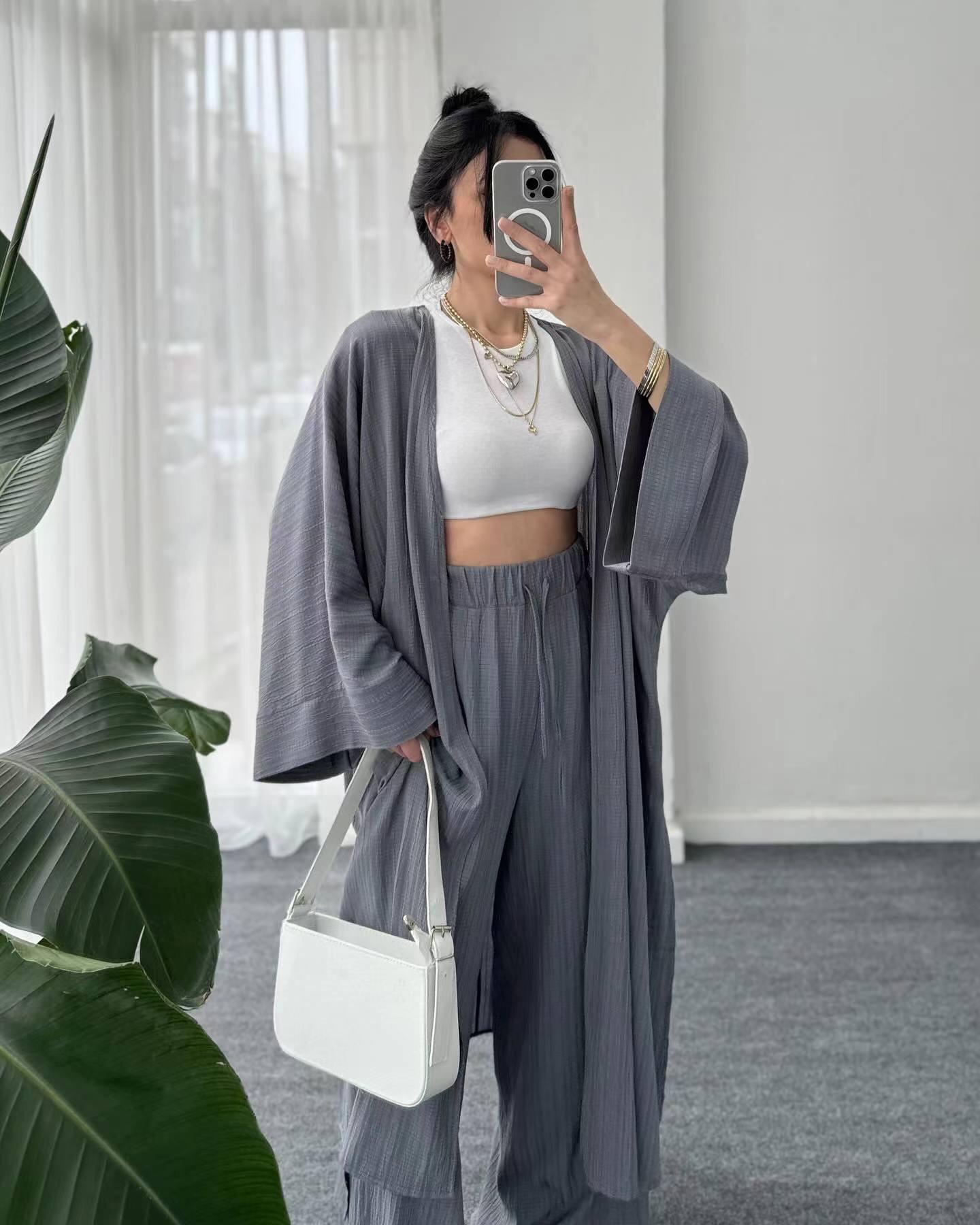 

Женский бежевый удлиненный кардиган и брюки палаццо 3XL серый