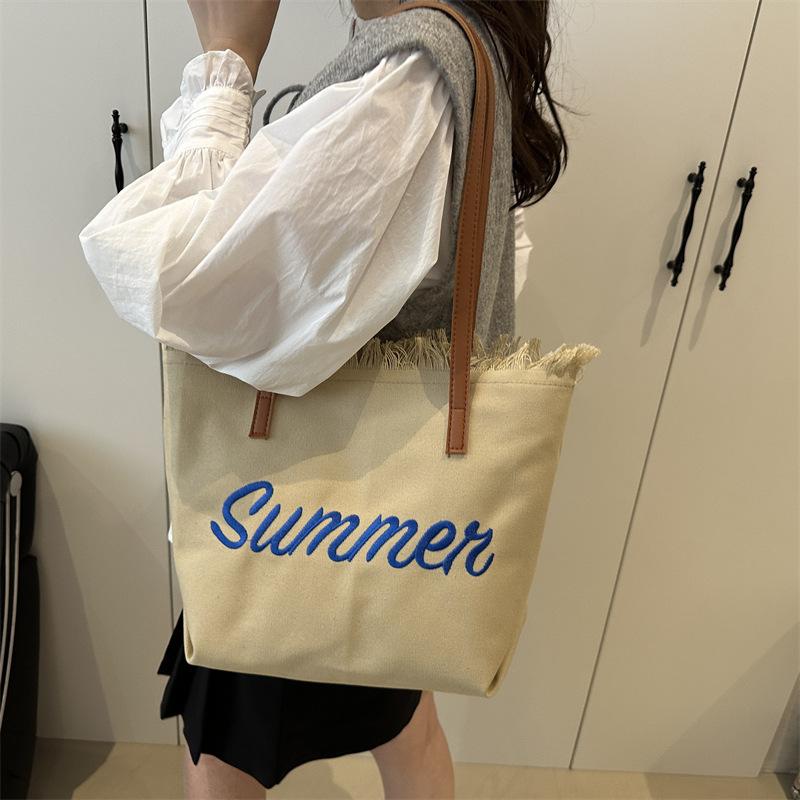2025 fairy bag girl new Korean version fringed portable shopping bag retro autumn and winter embroidery tote bag shoulder bag