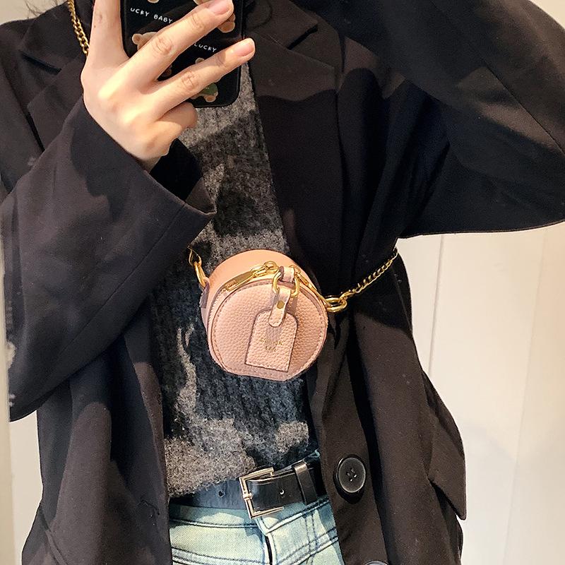 Exquisite and cute mini small pu solid color women's change mouth red envelope 24 spring new shoulder messenger bag