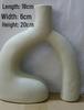 White Ceramic Vase with Dried Baby's Breath for Living Room or Dining Table Decoration