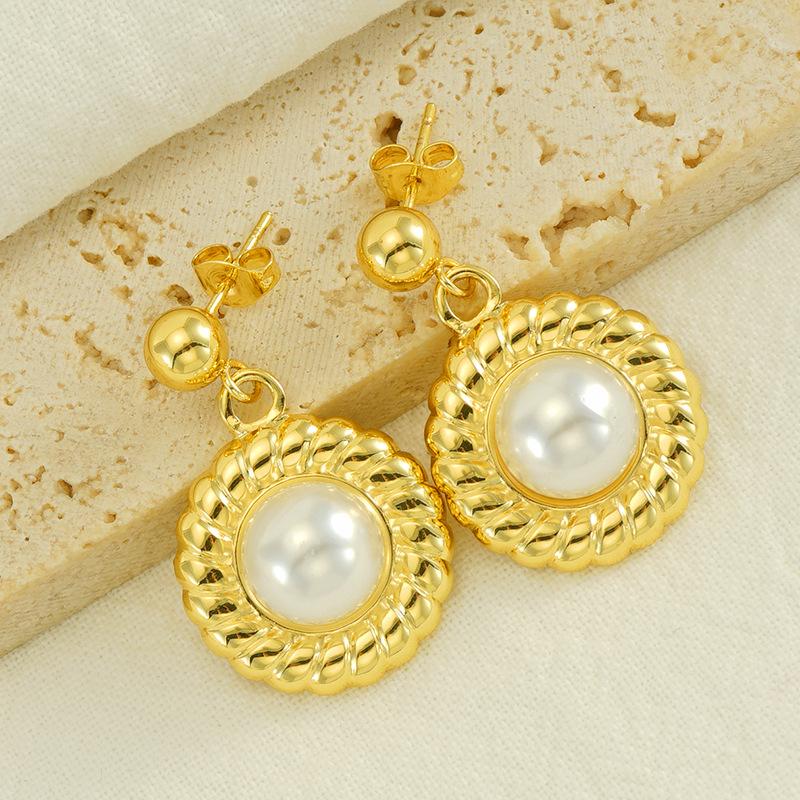 Simple and versatile high-end stainless steel sunflower pearl earrings French titanium steel earrings women
