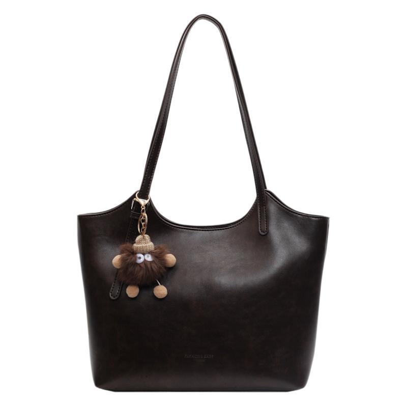 This Year's New Niche Design Commuting Versatile Soft Leather Texture Retro Large Capacity Portable Shoulder Tote