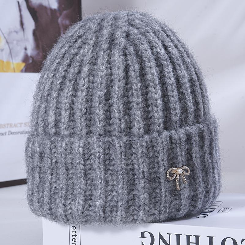 

Женская новая зимняя теплая вязаная шапка, корейская универсальная, для большого обхвата головы, подчеркивающая лицо, маленькая, ветрозащитная, с защитой ушей, шерстяная шапка