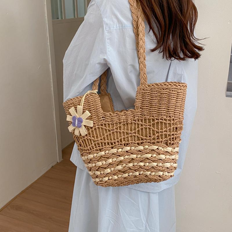 Handwoven Natural Fiber Tote Bag with Braided Handles and Open Weave Design