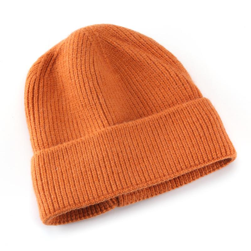 Women's autumn and winter solid-color, fleece-lined, warm knitted hat for outdoor activities, cycling, and cold weather protection, with ear flaps